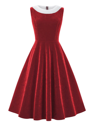Abito in velluto con collo di pelliccia rosso anni '50