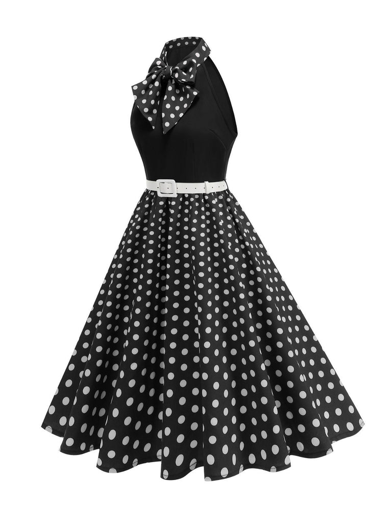 Abito a pois con cintura e collo a fiocco anni '50