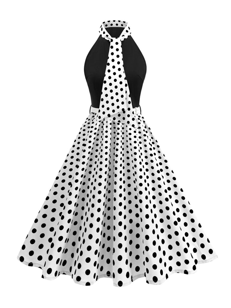 Abito a pois con cintura e collo a fiocco anni '50