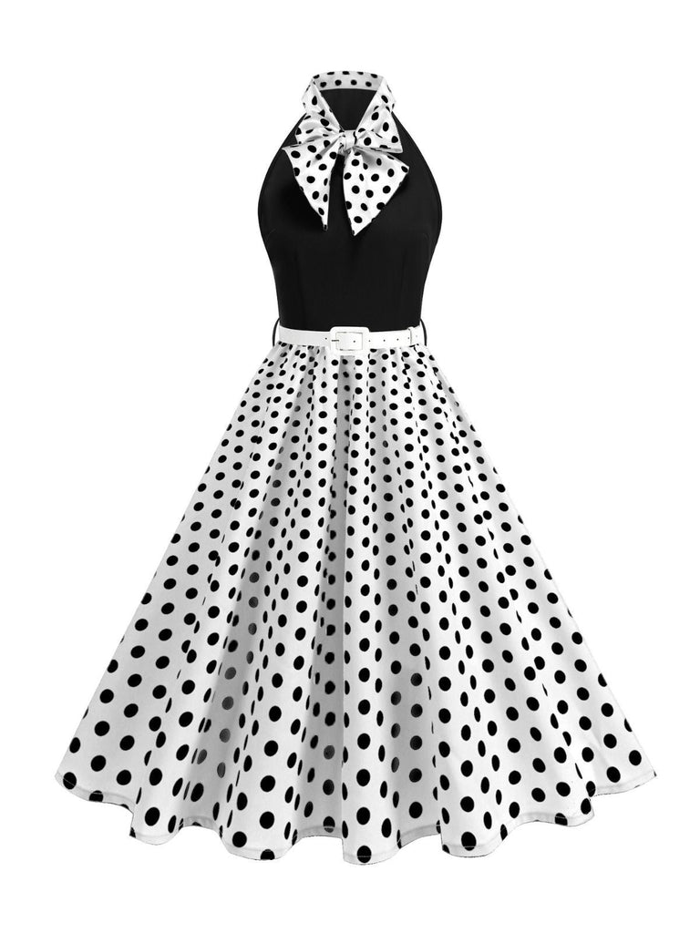 Abito a pois con cintura e collo a fiocco anni '50