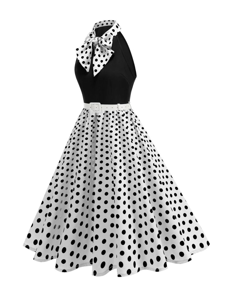 Abito a pois con cintura e collo a fiocco anni '50