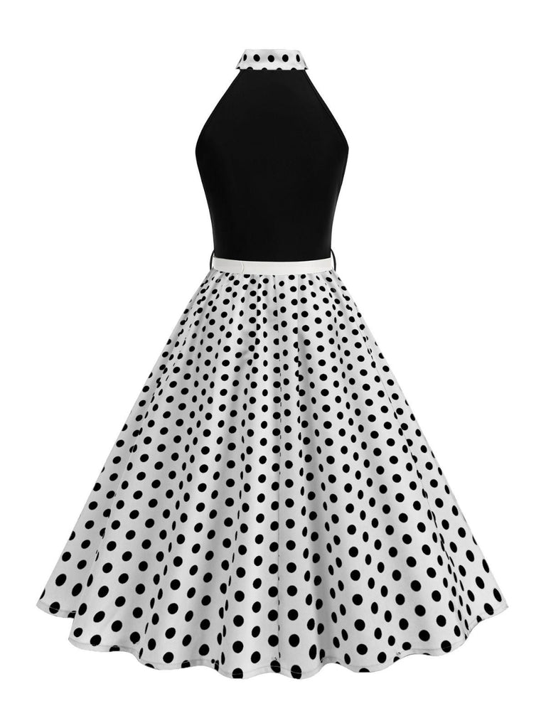 Abito a pois con cintura e collo a fiocco anni '50