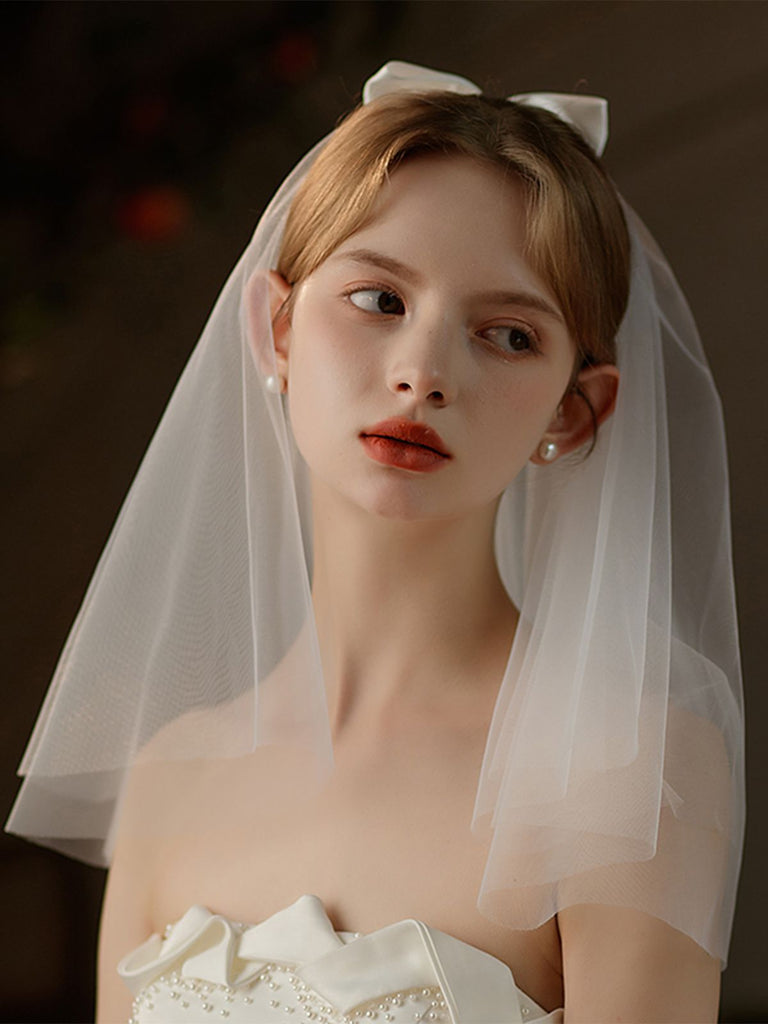Velo da sposa con fiocco bianco vintage