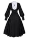 Abito con collana a croce in stile suora nero anni '40