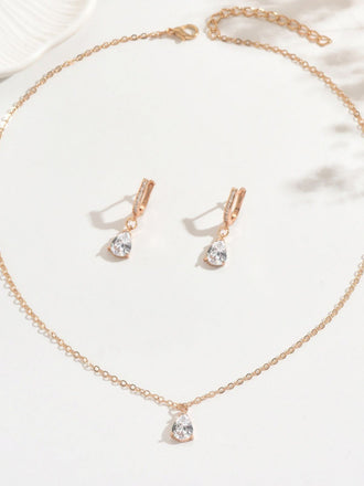 Set di orecchini pendenti e collana in oro