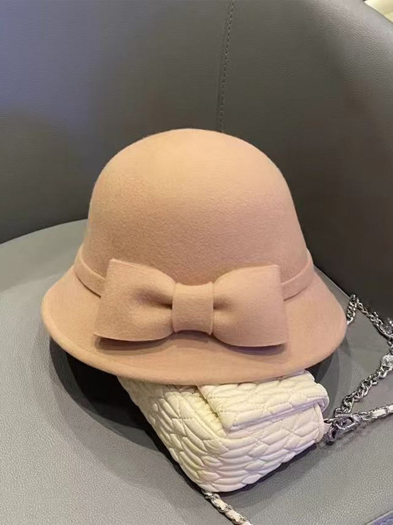 Cappello a cloche con fiocco in lana sintetica