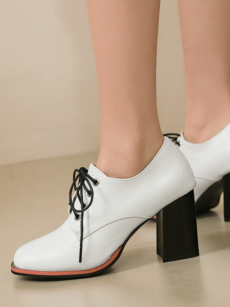 Scarpe vintage in pelle con lacci e tacco spesso