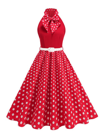 Abito a pois con cintura e collo a fiocco anni '50