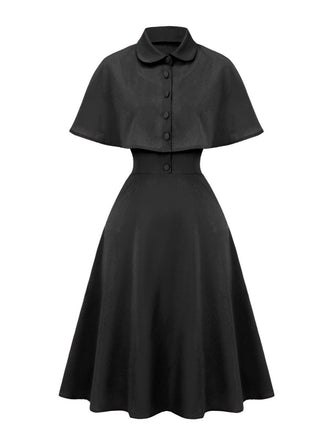 Abito con mantella e revers a tinta unita nero anni '50