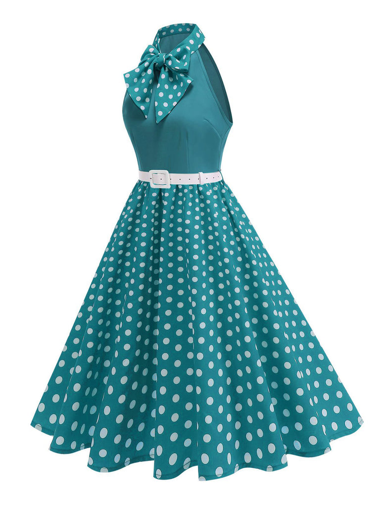 Abito a pois con cintura e collo a fiocco anni '50