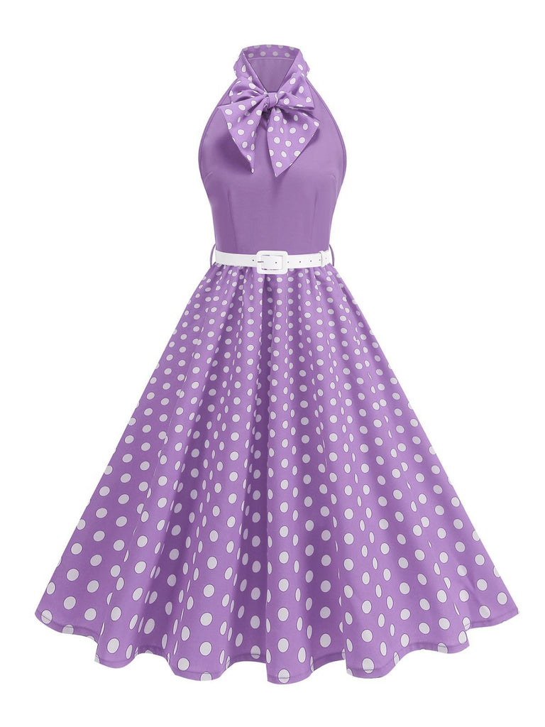 Abito a pois con cintura e collo a fiocco anni '50