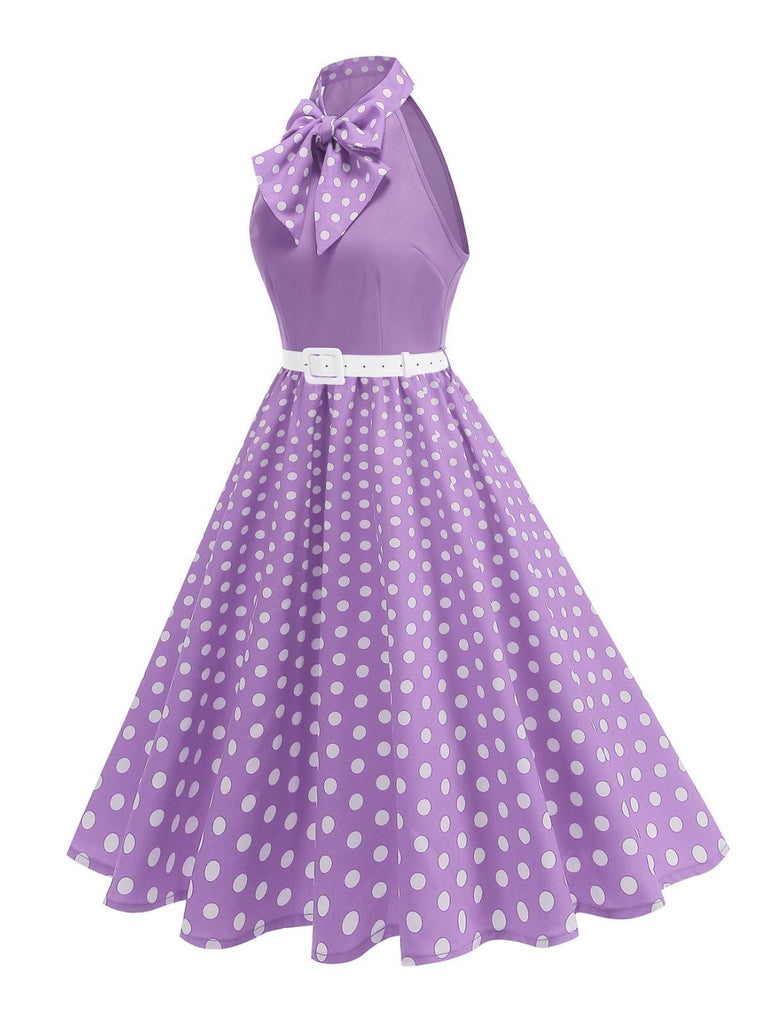 Abito a pois con cintura e collo a fiocco anni '50