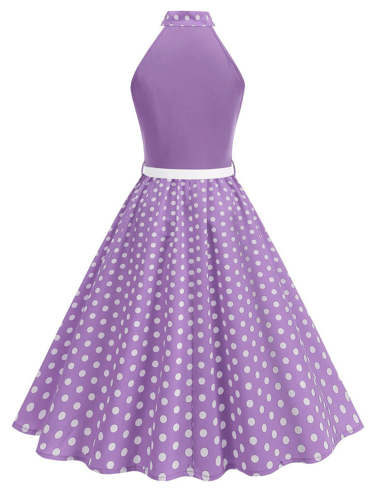 Abito a pois con cintura e collo a fiocco anni '50