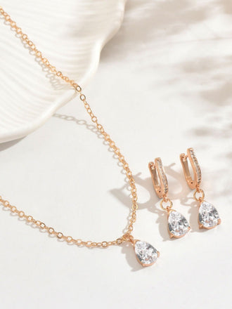 Set di orecchini pendenti e collana in oro