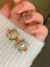 Orecchini vintage con strass e fiocco di neve natalizio