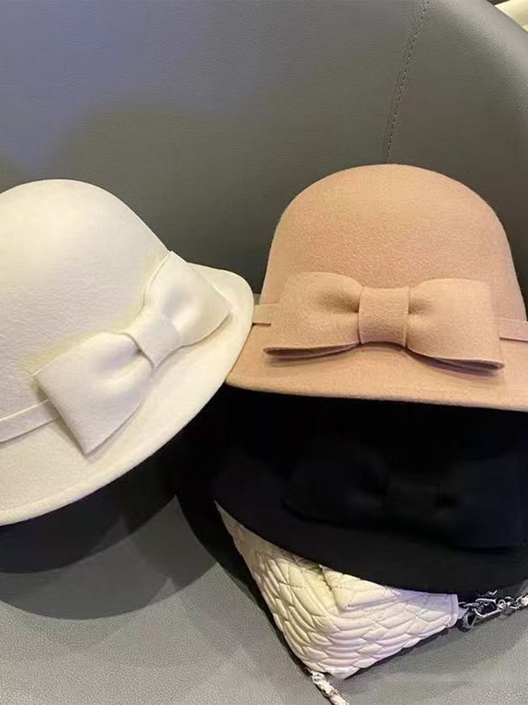Cappello a cloche con fiocco in lana sintetica
