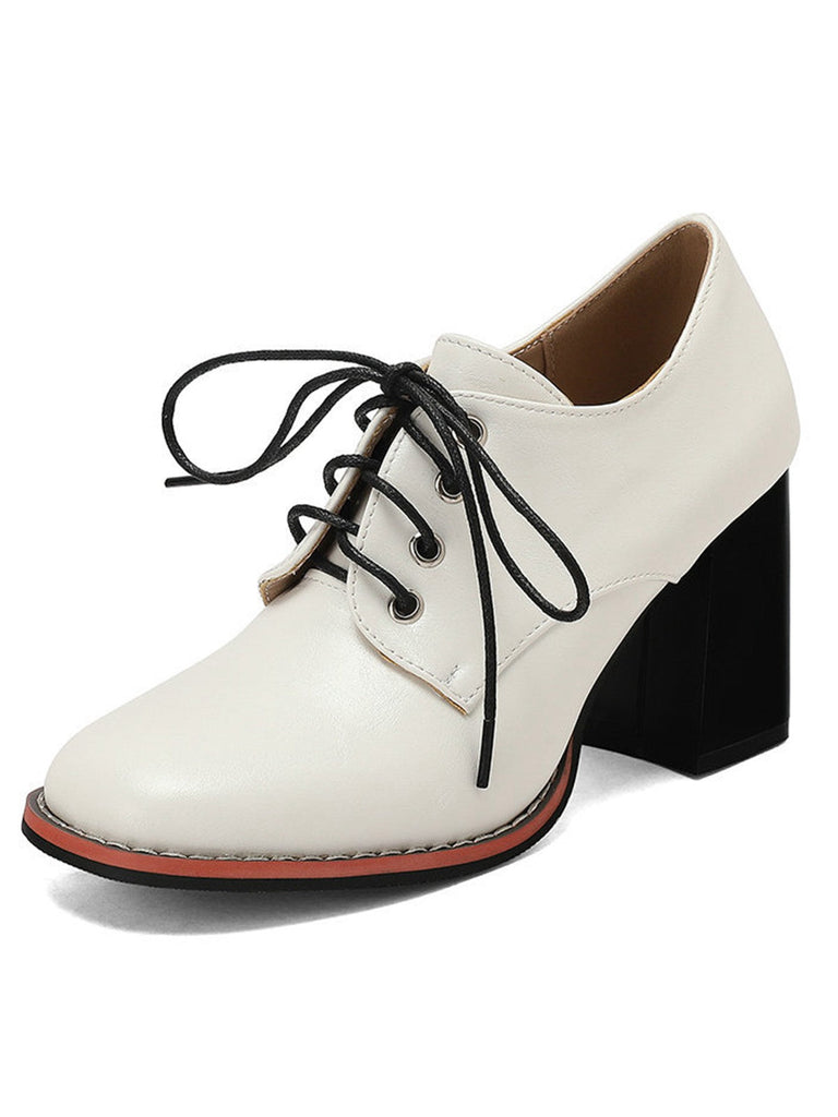 Scarpe vintage in pelle con lacci e tacco spesso