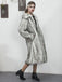 Cappotto lungo in pelliccia sintetica con risvolto anni '30