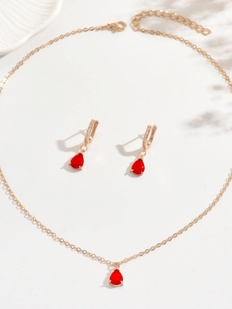 Set di orecchini pendenti e collana in oro