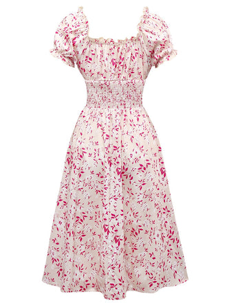 Abito floreale con scollo a V e maniche a sbuffo rosa anni '40