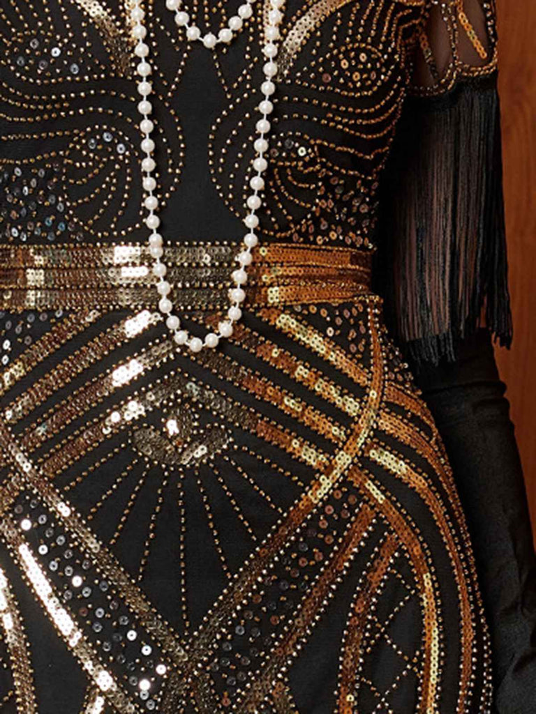 Abito lungo in paillettes e nappe con scollo a V oro anni '20