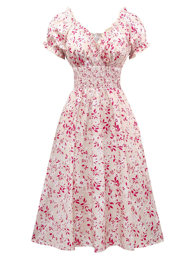 Abito floreale con scollo a V e maniche a sbuffo rosa anni '40