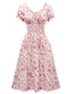 Abito floreale con scollo a V e maniche a sbuffo rosa anni '40