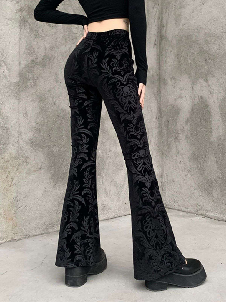 Pantaloni bootcut in velluto con stampa punk anni '80
