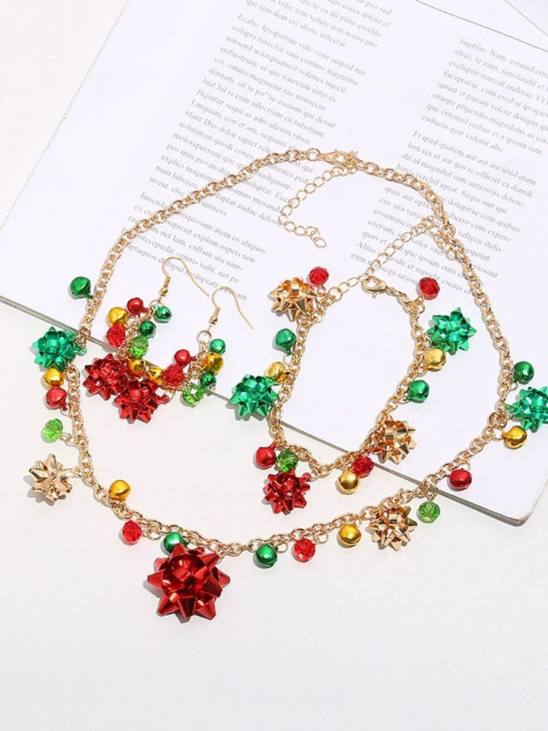 Set di collana e bracciale e orecchini con campanella a fiore Natale