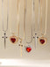 2PCS Collana con rubino a forma di cuore e spada in strass