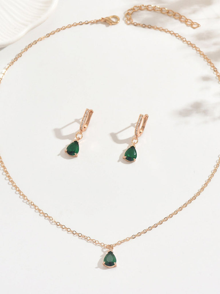 Set di orecchini pendenti e collana in oro