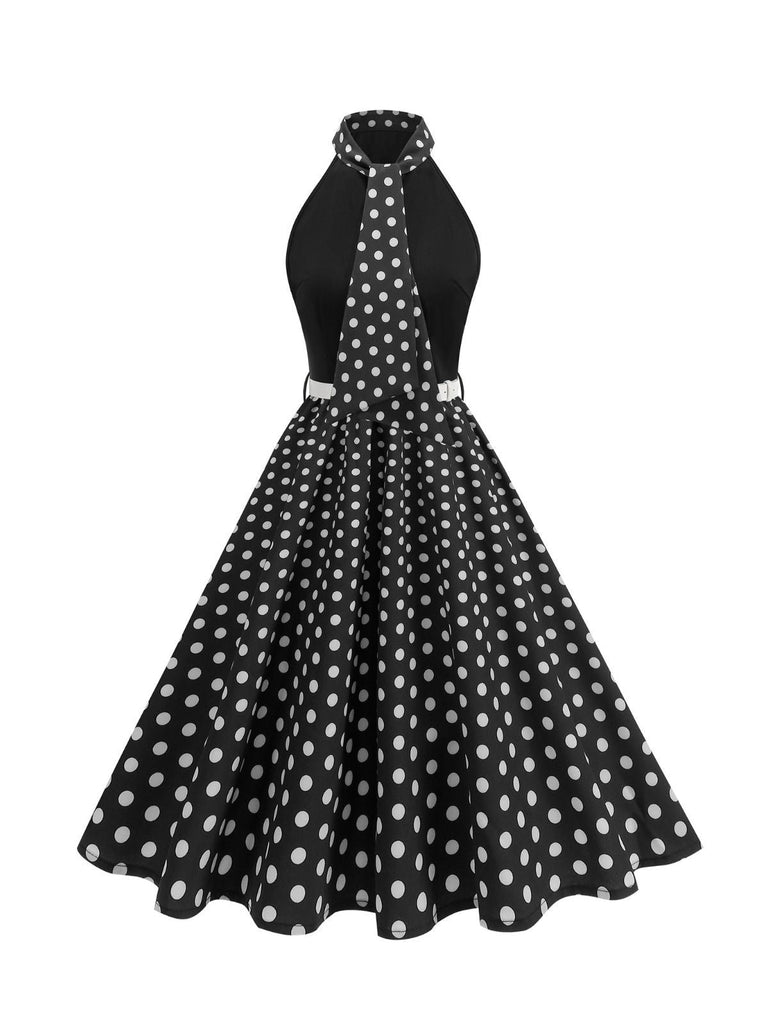 Abito a pois con cintura e collo a fiocco anni '50