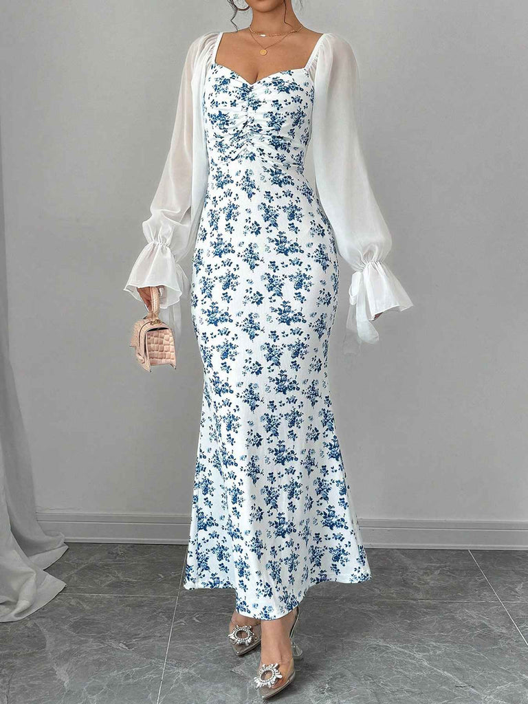 This Blue 1930s Chiffon Sleeves Ditsy Floral Dress wraps her in 1930s elegance, one twirl at a time