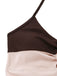 Close-up of a brown and beige dress with a white background