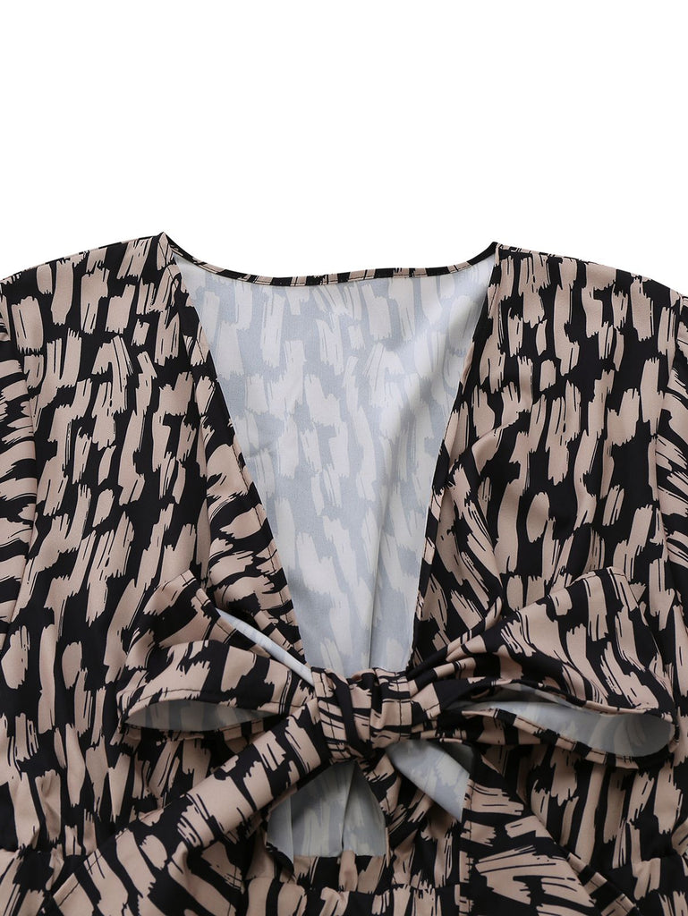 Tuta corta marrone anni '40 in raso leopardato con scollo a V