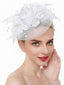 Copricapo da sposa con piume e fiori in rete
