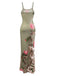 Green dress with floral patterns on a white background