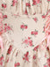 Abito a ruota con lacci e fioreale rosa anni '50