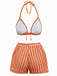 Orange and white bikini set on a white background