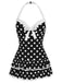 Vintage-inspired black and white polka dot one-piece swimsuit with a halter neck and white bow detail.