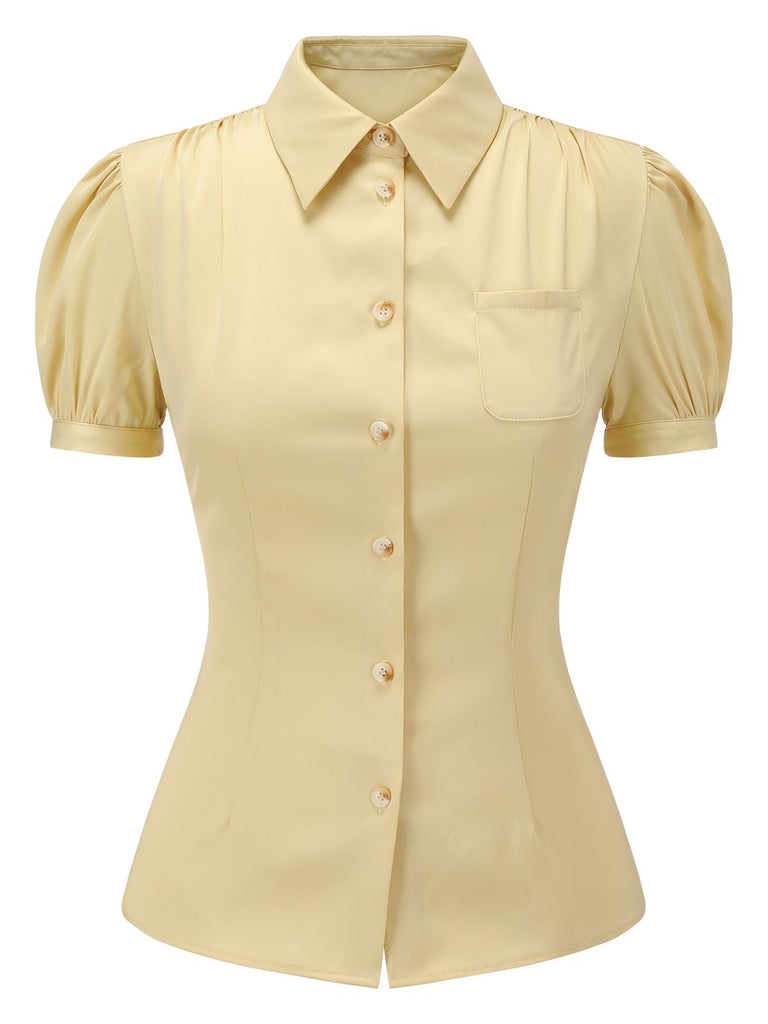 Camicetta con maniche a sbuffo e revers giallo anni '40