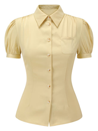 Camicetta con maniche a sbuffo e revers giallo anni '40