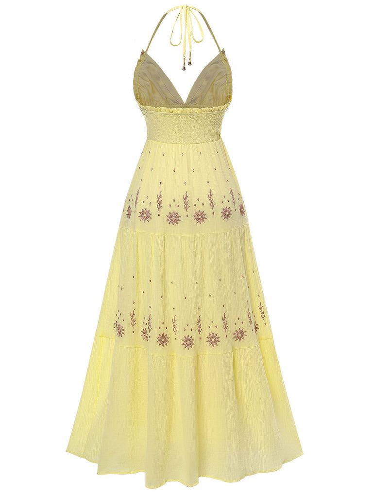 Abito giallo scollo a V e ricami floreali anni '30