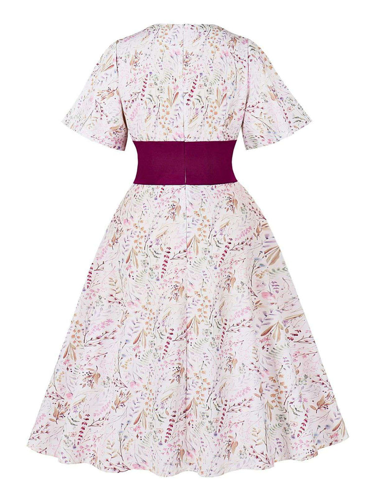 Abito floreale con maniche a campana rosa anni '50