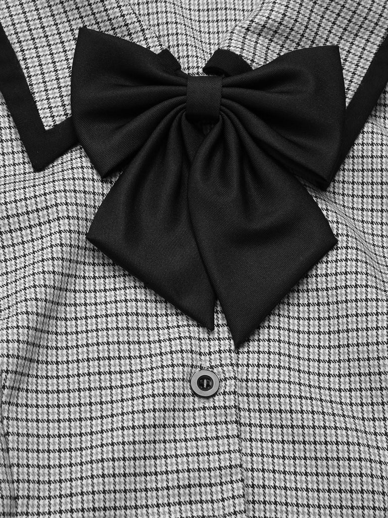 Abito in pied de poule con colletto a fiocco anni '50