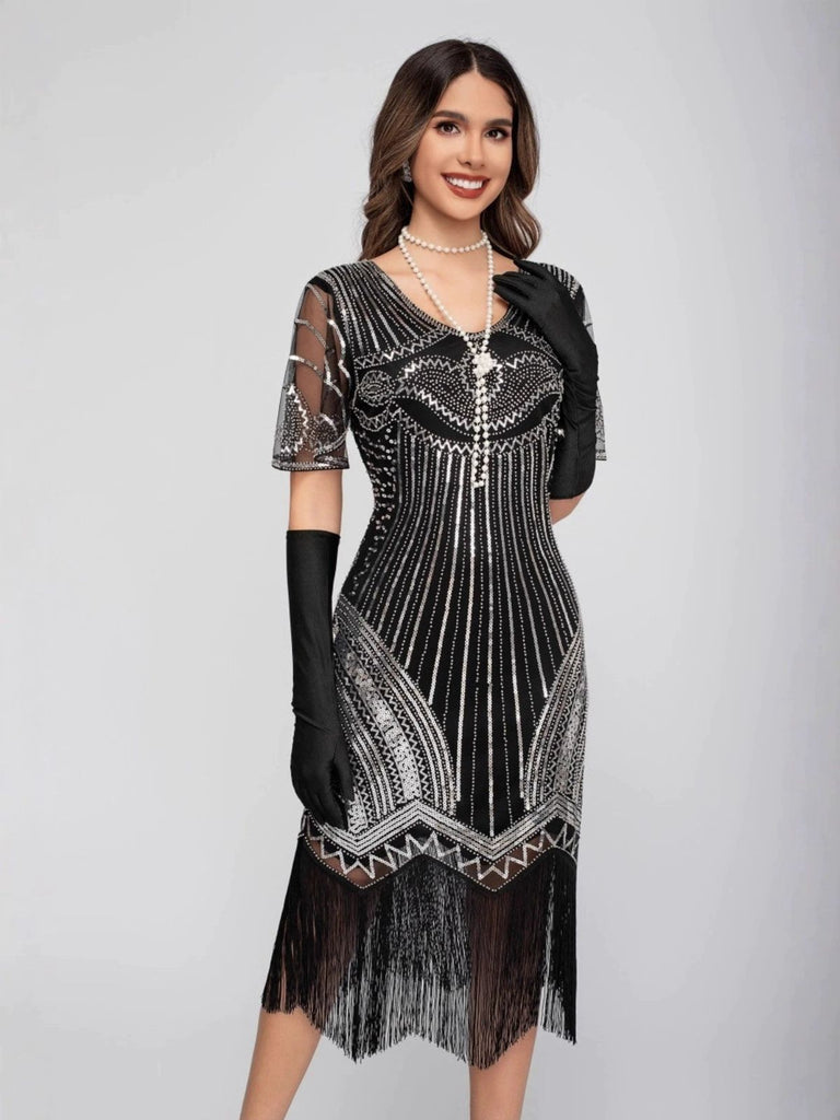 Abito Charleston nappe in paillettes  con scollo a barchetta anni '20