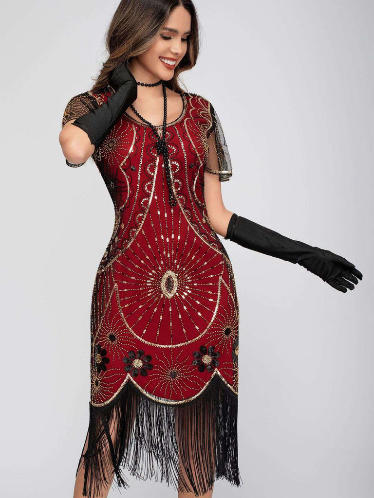 Abito flapper con frange di paillettes e scollo a barchetta anni '20