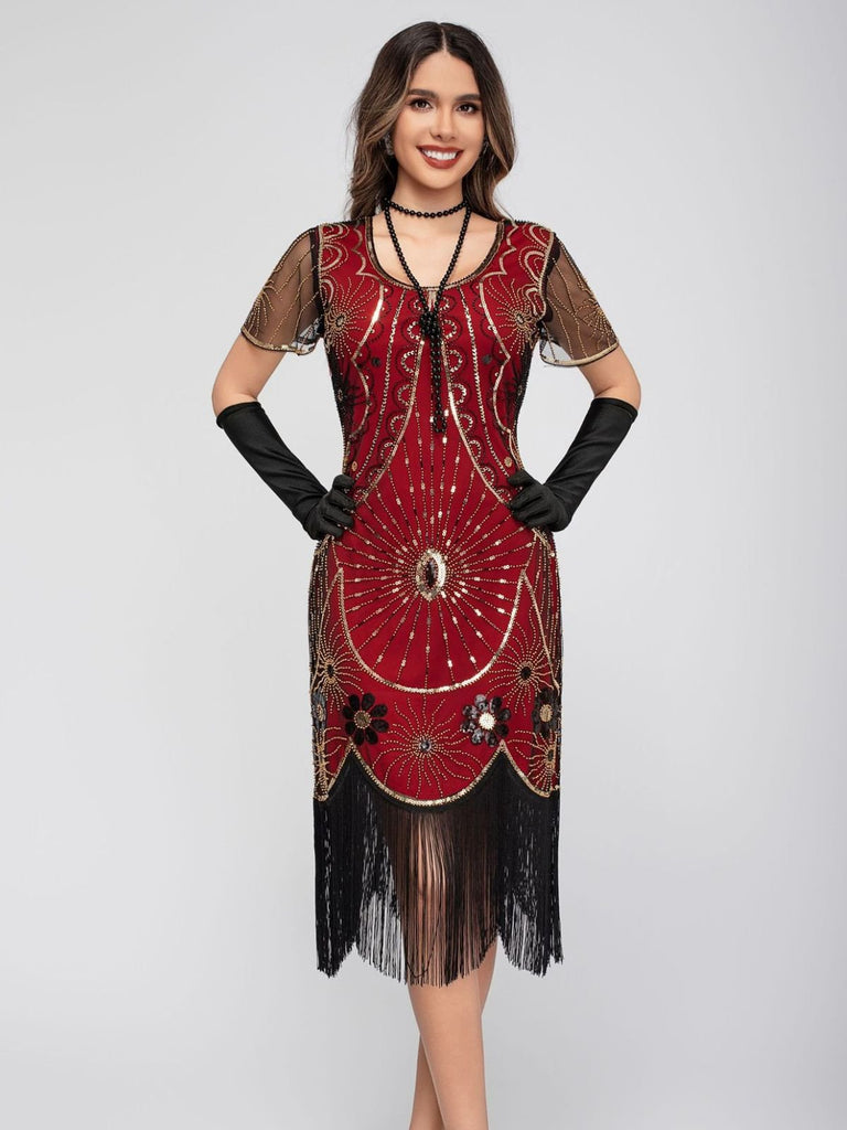 Abito flapper con frange di paillettes e scollo a barchetta anni '20