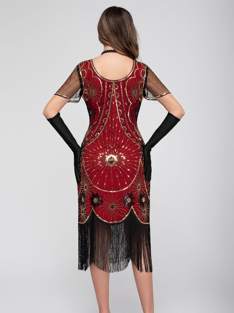 Abito flapper con frange di paillettes e scollo a barchetta anni '20