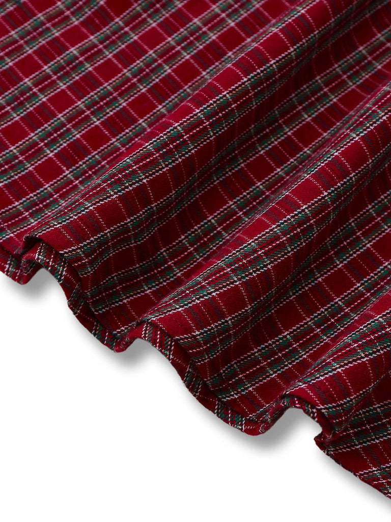Abito a quadri con scollo a cuore e fiocco rosso anni '50